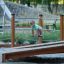 Attrezzatura da gioco Training twist & sit con componenti in legno e metallo per l'equilibrio dei bambini an
