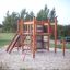 Struttura da gioco all'aperto per bambini con elementi per arrampicarsi, chiamata Kiosk.