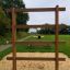Step And Climb wooden ladder in un'area giochi.