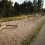 Attrezzatura fitness all'aperto Balance installata in un parco.