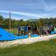 Attrezzatura da parco giochi Majestic Ship with Slide, struttura blu e in legno a forma di nave, all