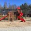 Twister castle with slide in un parco giochi