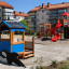 Twister castle with slide in un parco giochi moderno