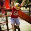 Bambini che giocano su Twister castle with slide in un parco giochi