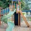 Twister castle with slide in un parco giochi