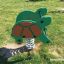 Turtle rocking giostra a molla per parco giochi in verde e marrone sull'erba