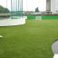 Campo sportivo all'aperto con erba artificiale e porte da calcio, Multiarena.