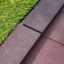 Rubber Tiles 55 superficie di sicurezza per parco giochi accanto all'erba sintetica
