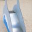 Dolphin Slide in un parco giochi sabbioso