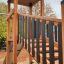 Struttura da parco giochi in legno con scivolo chiamata Explorer castle with slide.