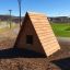 alt=Struttura da gioco in legno Small House nel parco