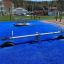Single Seesaw su una superficie blu del parco giochi