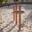 Attrezzatura da parco giochi Somersault Double in un'area giochi sabbiosa.