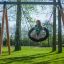 Bird Nest Swing with Tower (BNS 90 cm) playhouse with slide in un contesto di giardino